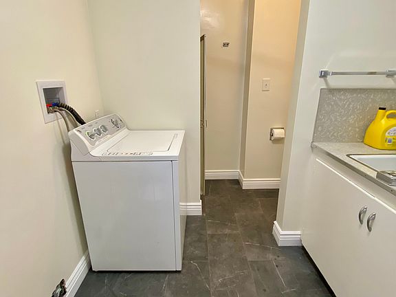 Laundry, toilet, sink, shower