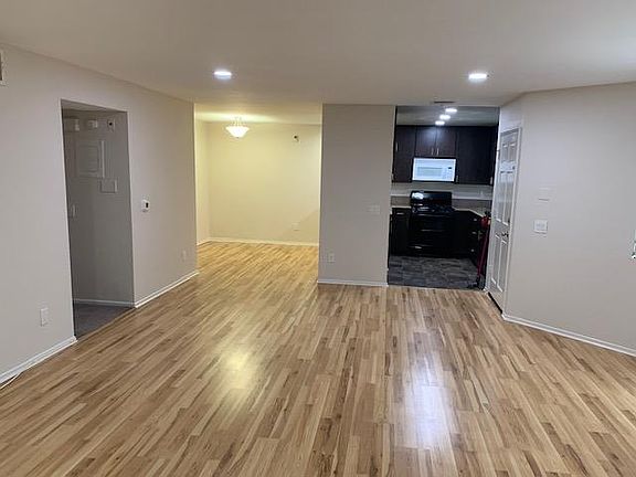 View of kitchen and dining area from living room.