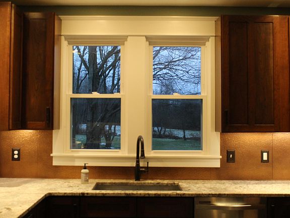 Window overlooking beautiful woods.