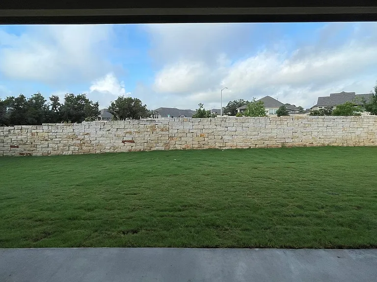 Private Backyard with Stonewalls