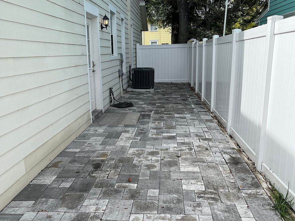 View of the Courtyard from the driveway toward the front yard.