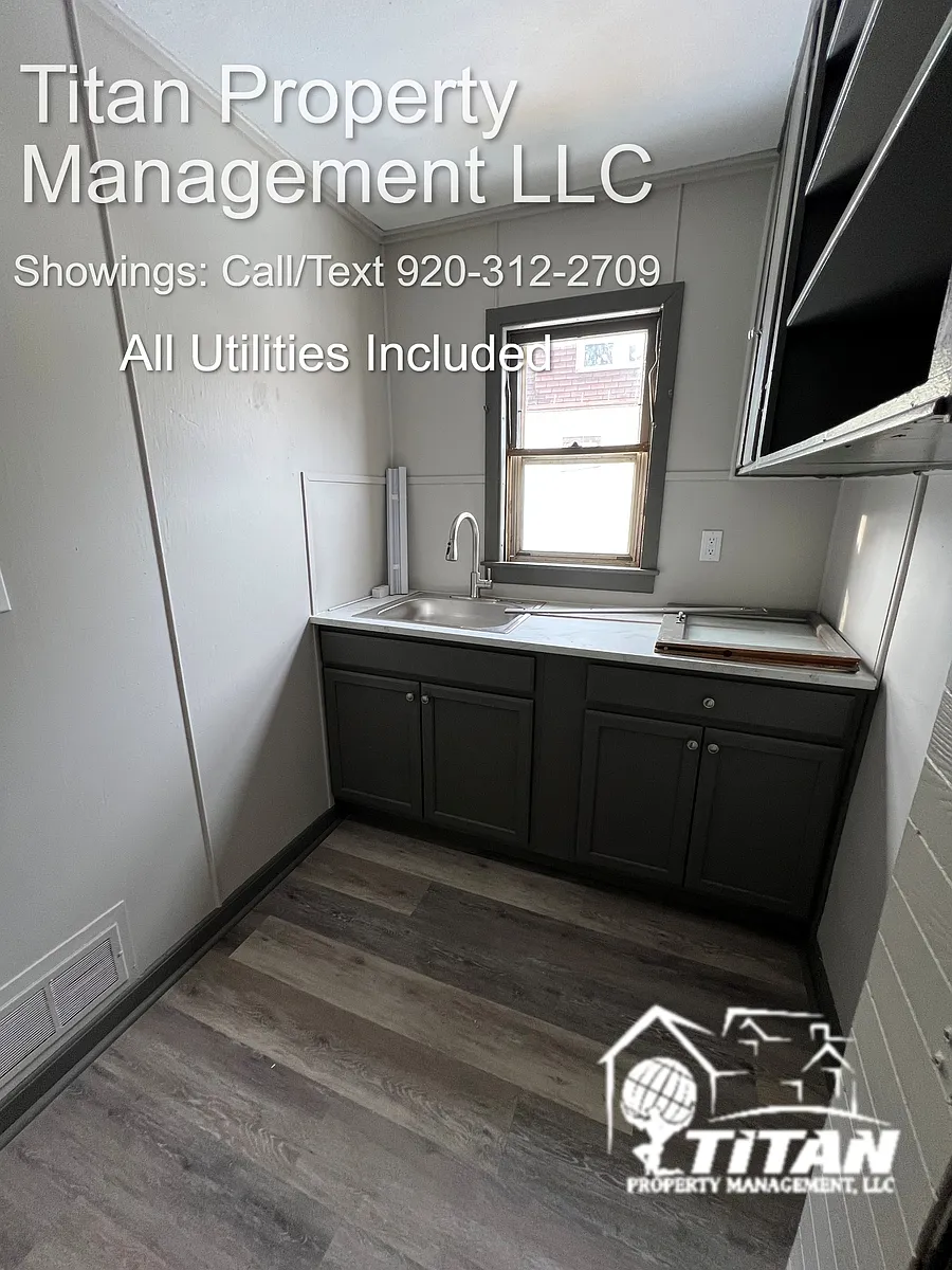 Building Photo - 100 E Merrill Ave #2