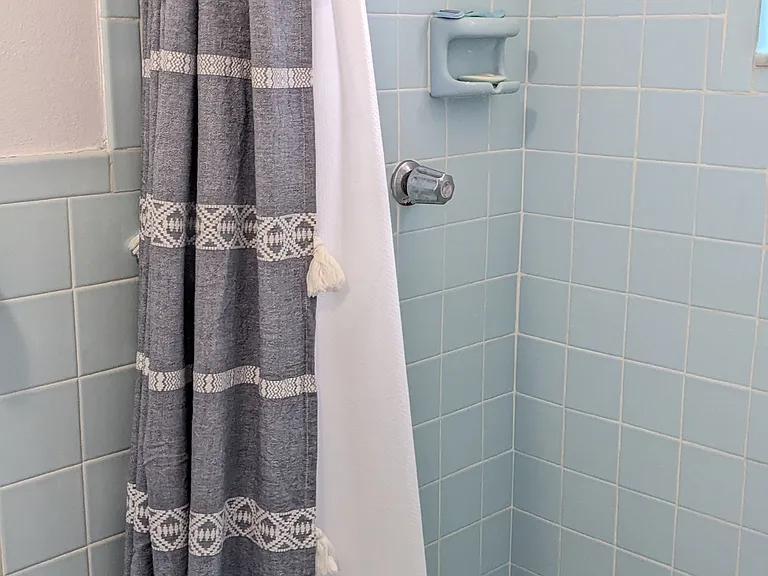 Bathroom with shower off of Kitchen