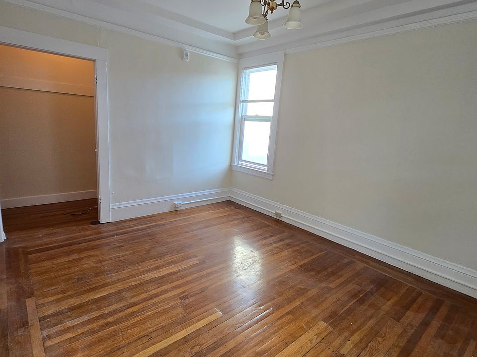 Living room with view of closet/office