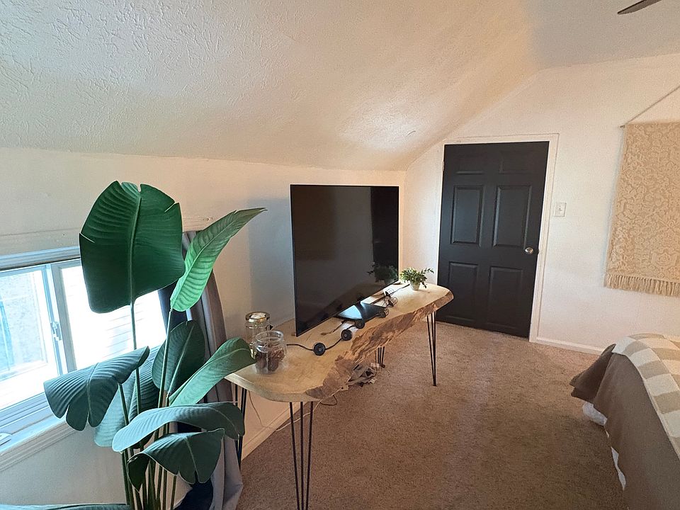 Primary bedroom gets great light; has a flex space off of the bedroom through the door.