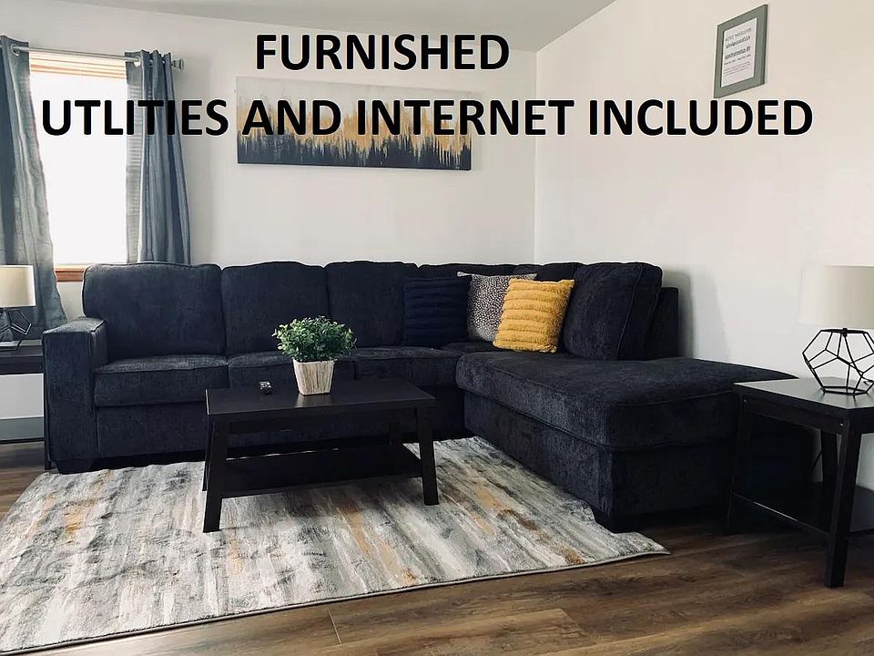 Modern living room with a cozy sectional couch!