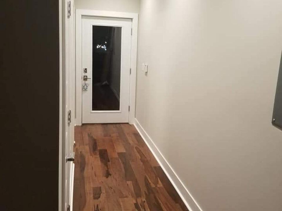 Hallway leading to rear patio