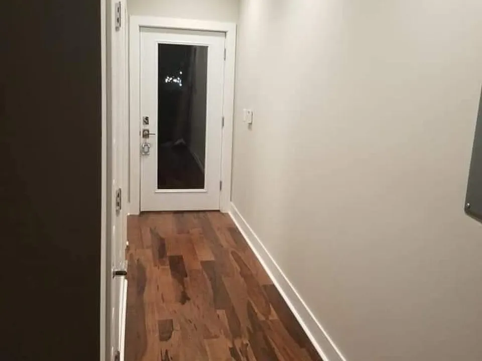 Hallway leading to rear patio