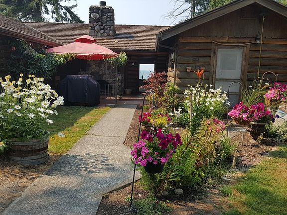 Entry with outdoor fireplace