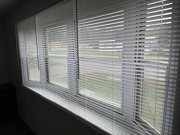 spare bedroom bay window with shelf