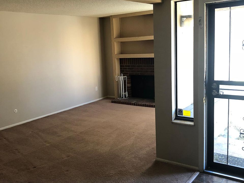 Entrance and living room. Working fireplace