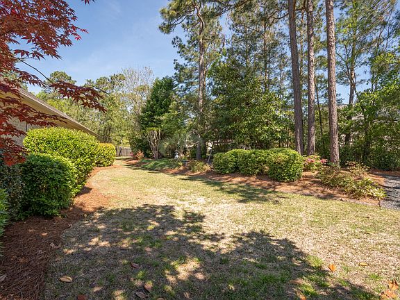 Walking path on side of house. Access to lake and private walking trails and gazebo