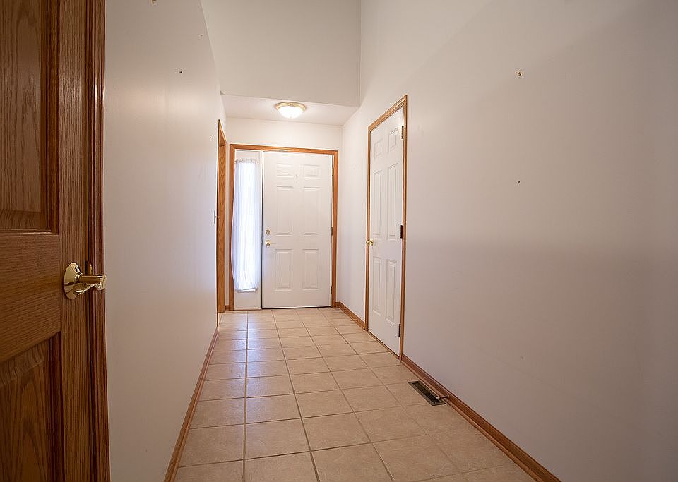 Entry way with coat closet.