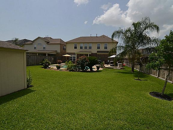 Large yards are hard to come by! This one has it all! Pool/Spa, Covered patio, extra deck, storage shed and play set with plenty of room left over for volleyball, trampoline and more.