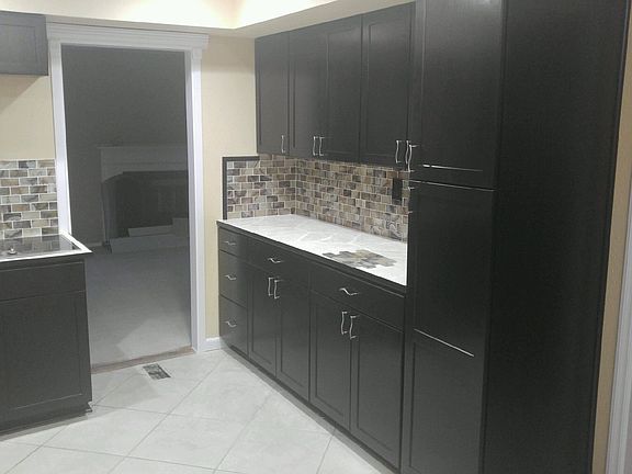 Kitchen entrance to formal living room