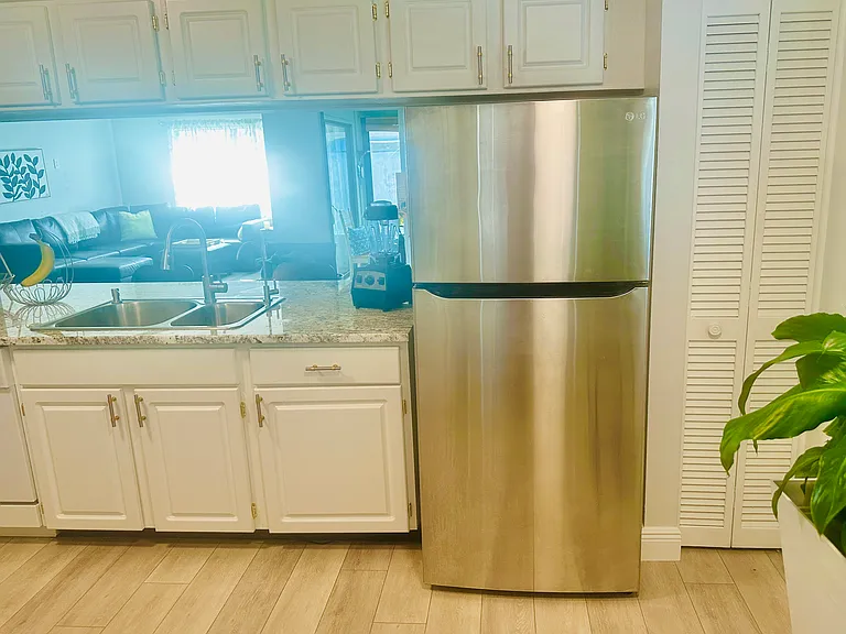 View from kitchen into great room.