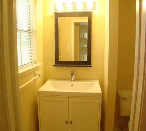 Recently remodeled owners bath with recently vanity, tile flooring and shower and new fixtures.