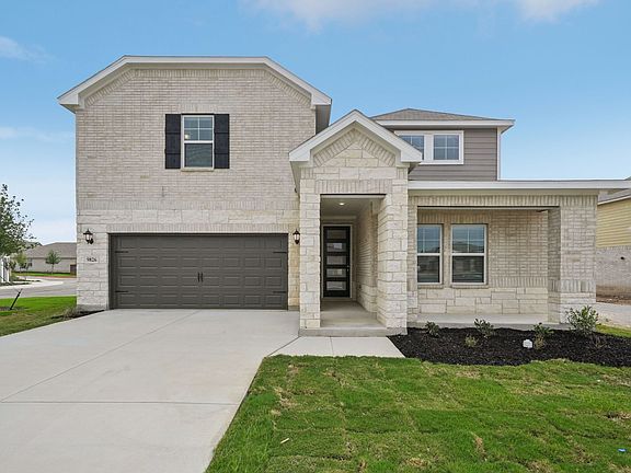 Front exterior of the Beckley floorplan at a Meritage Homes community.