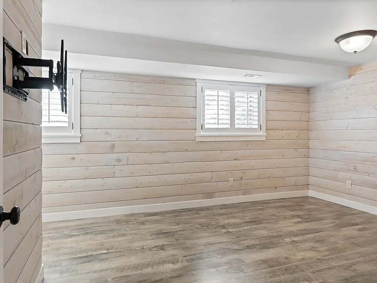 master bedroom with TV mount