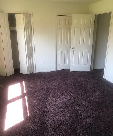 Master bedroom with double closets