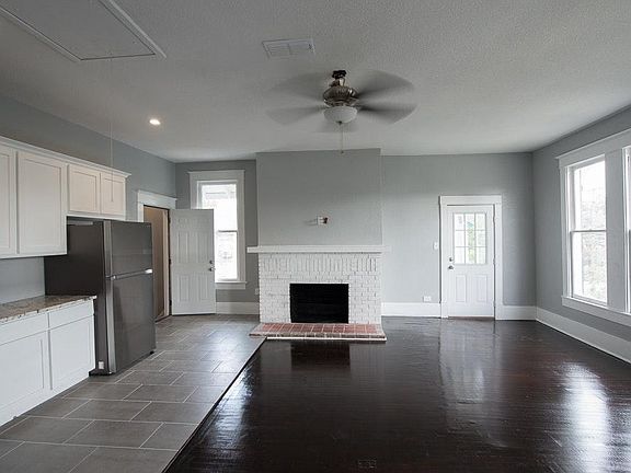 Spacious, open, bright and inviting living area and kitchen.