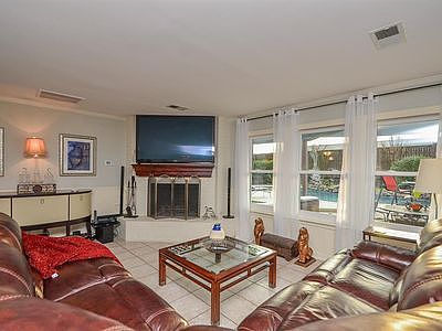 Family room overlooks pool