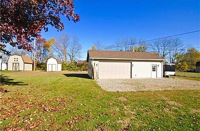 Side with the large garage