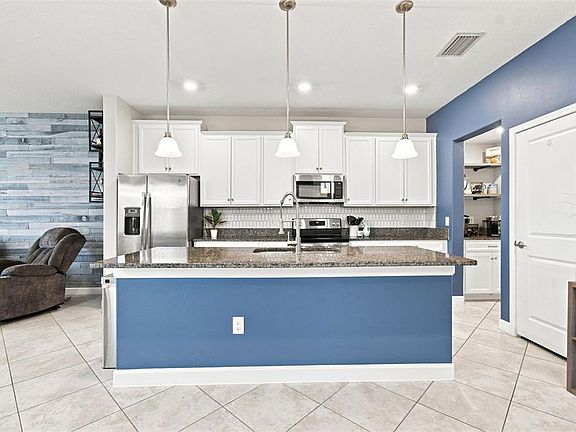5th image of 3207 PAINTED BLOSSOM COURT