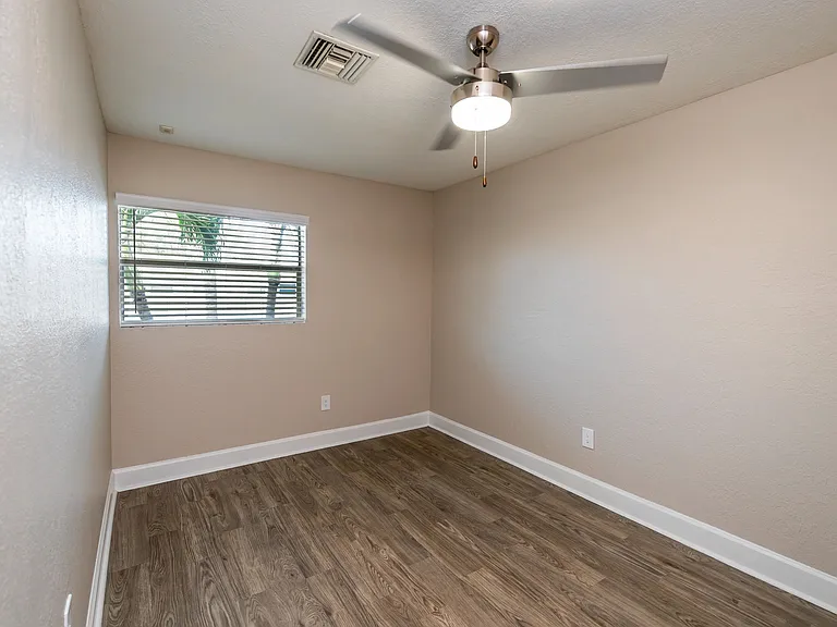 Create your personal haven in a cozy bed space with adjustable privacy blinds and a ceiling fan for customizable lighting.
