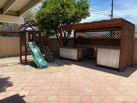 Playground for kids. Bar/BBQ area for adults.