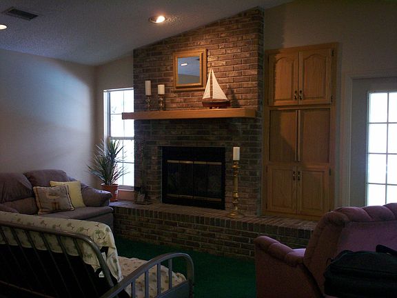 Great room with fireplace and vaulted ceiling