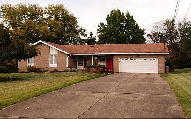 Front of house. Very long driveway