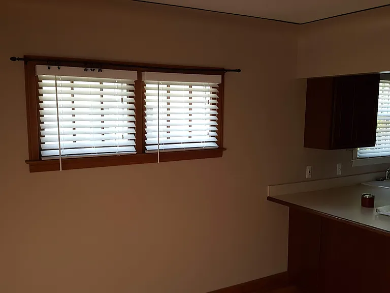 Dining room window, kitchen to right