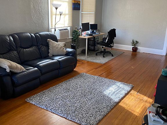 Large living room with plenty of space for an office
