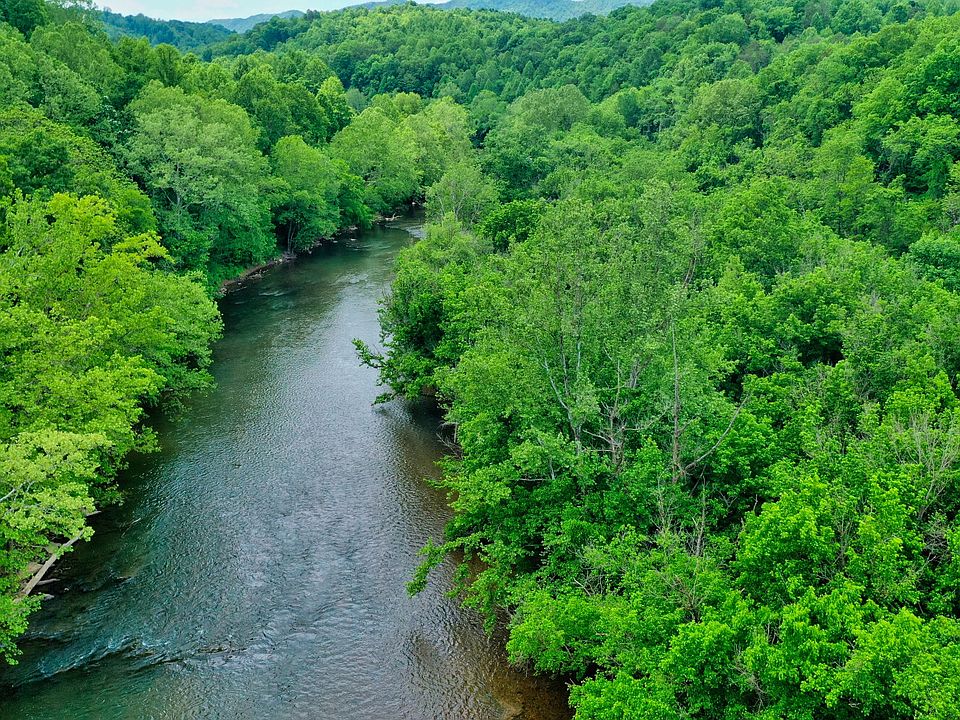 Looking downriver from the rapids, property is on the right.
