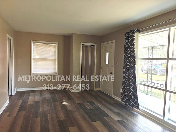 Living room from hallway side facing front door