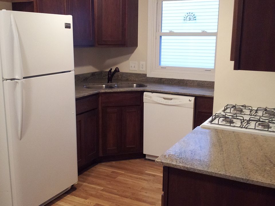 Updated Kitchen with Granite, new cabinets, and hardwood flo