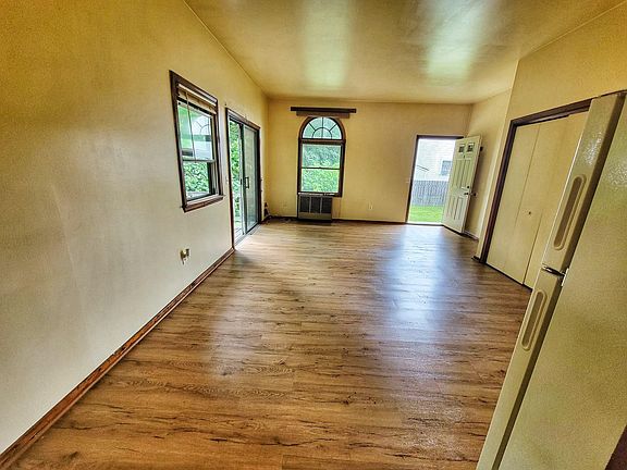 living room with sliding glass door to deck