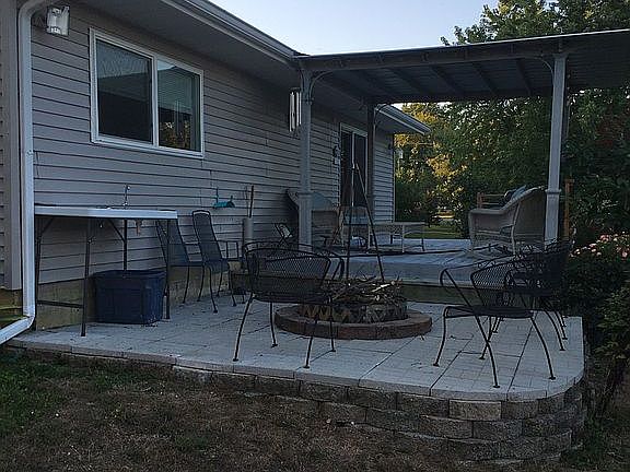 Fire pit and covered deck.
