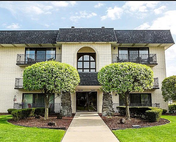 Front view of the building. Condo is on the right upper corner