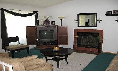 Spacious Living Room with Fireplace