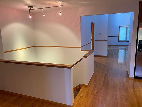 Stair to lower level off kitchen.