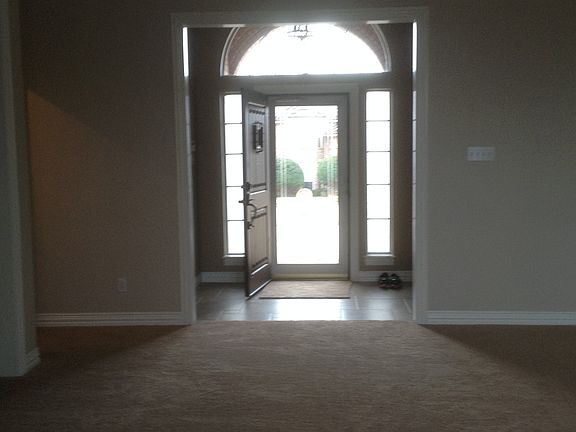 Formal Entry with coat closet and french doors leading to fo