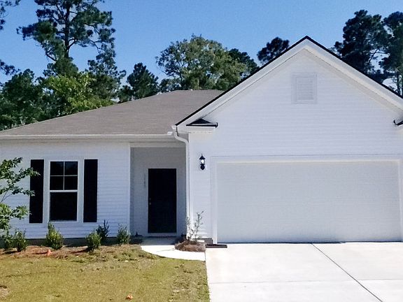 Morgan Exterior LC1A with a two-car garage. Representative photograph.