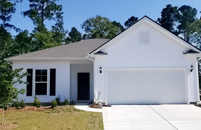 Morgan New Home Exterior LC1A with two car garage. Model Representation.