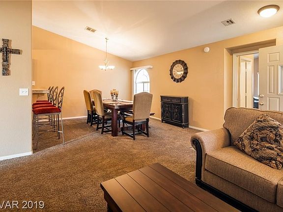 Relax in your New Condo..Living room and Dining Areas .. NEW Carpet ..Move-in-Ready Immaculate