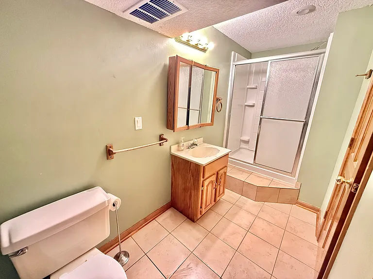 8257 N Woodland Ave — Photo 28