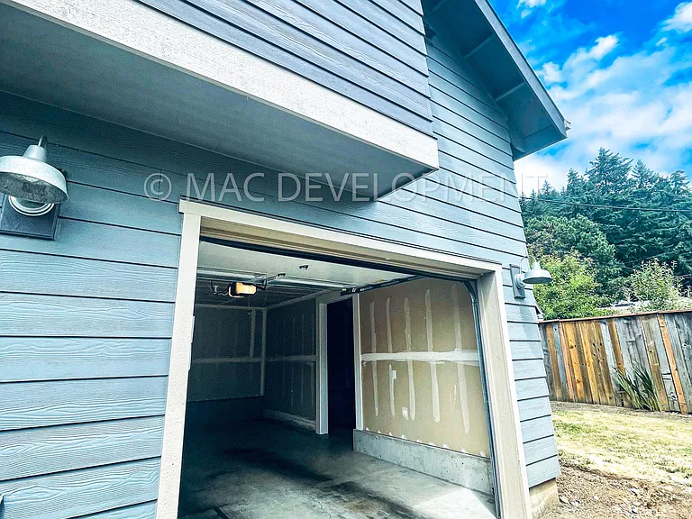 Exterior of Unit B and garage space