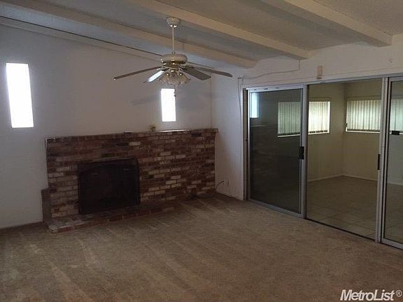 Family Room with vaulted celling and Brick Fireplace