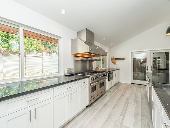 Clean-lined kitchen design with ample storage
